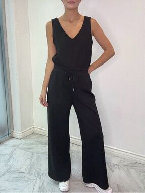Stitch & Co. 30A-Effortless Black V-Neck Wide-Leg Jumpsuit